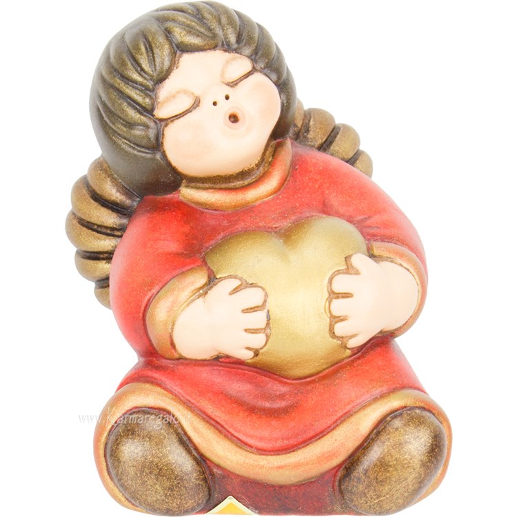 Angelo Lilli con cuore rosso 