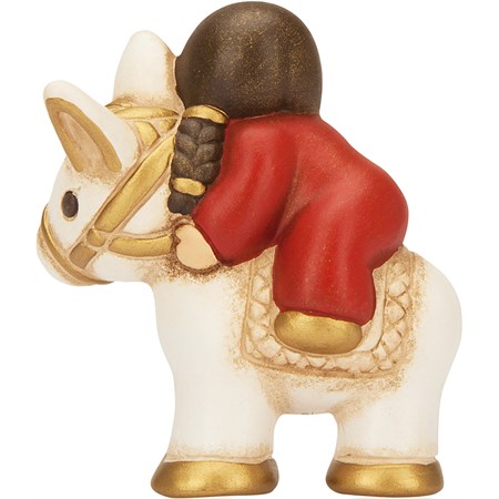 Bimba Su Asinello Rossa Presepe Classico in Casa