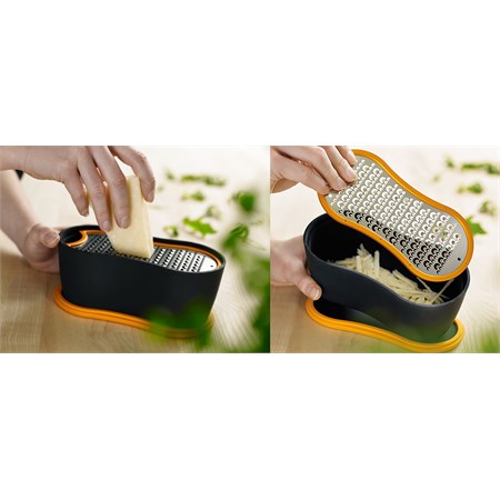 Grattugia con contenitore e coperchio salvafreschezza in Cucina